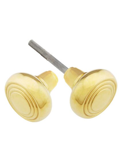 Pair of Streamline Deco Door Knobs in Polished Brass.